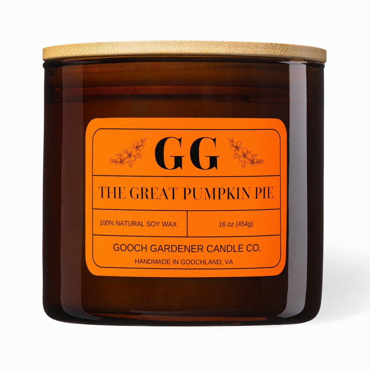 Brown candle with orange label featuring &
