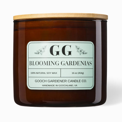 Gooch Gardener Candle Co. candle with wooden lid on a white background