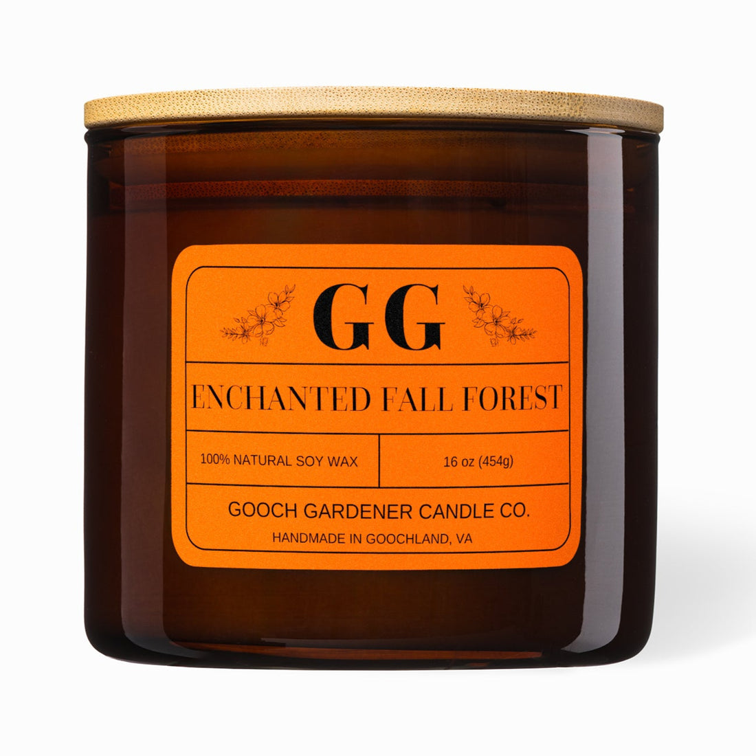 Brown candle with orange label featuring &