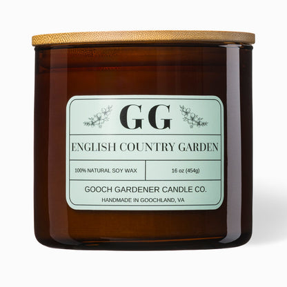 Gooch Gardener Candle Co. candle with wooden lid on a white background