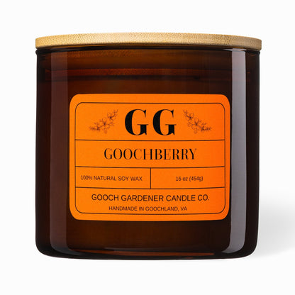 Goochberry candle with orange label on a white background