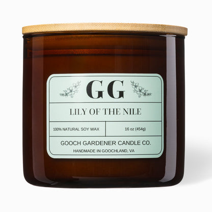 Gooch Gardener Candle Co candle with a wooden lid on a white background