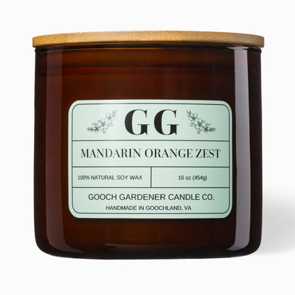 Gooch Gardener Candle Co candle with a wooden lid on a white background